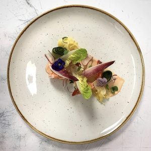 Tiger prawn cocktail, tabasco aioli, baby gem leaves, cucumber, radish and black caviar